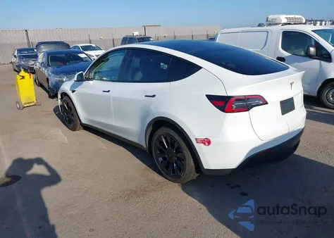 2022 Tesla Model Y из США, поврежденный, VIN 7SAYGDEE8NF491892
